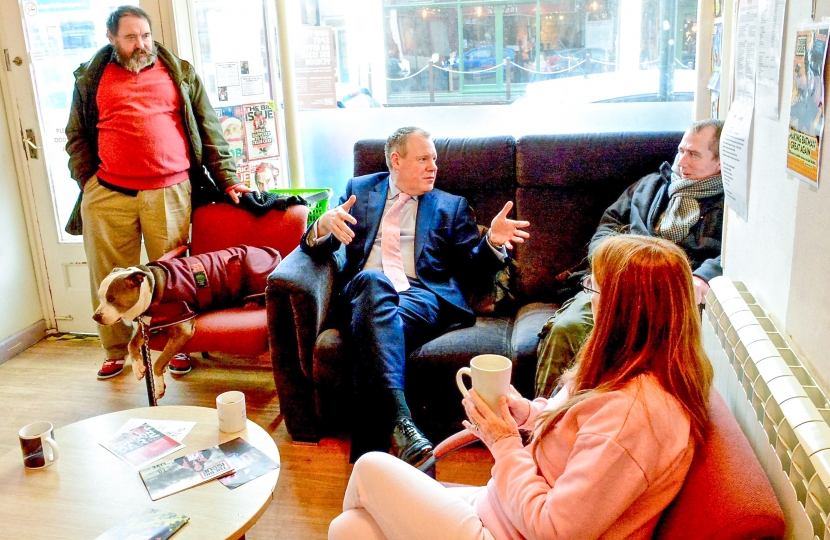 Conor with local The Big Issue vendors, discussing their experiences of selling the magazine.