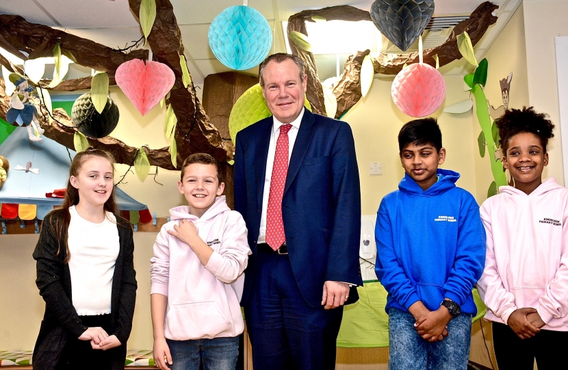 Conor with pupils at Kingsleigh Primary School.