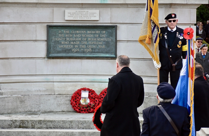 Conor pictured walking up to the steps of the Cenotaph to lay a wreath.