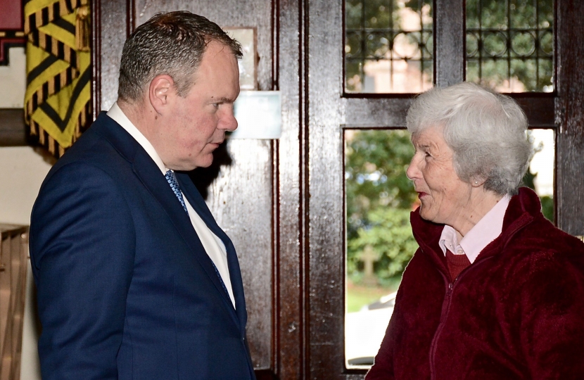 Conor pictured with a St Peter’s Church volunteer. 