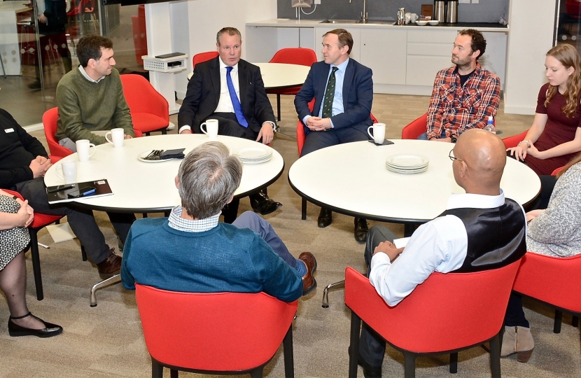 Conor pictured talking to the group. Also pictured is George Eustice MP & BU professors and students.  