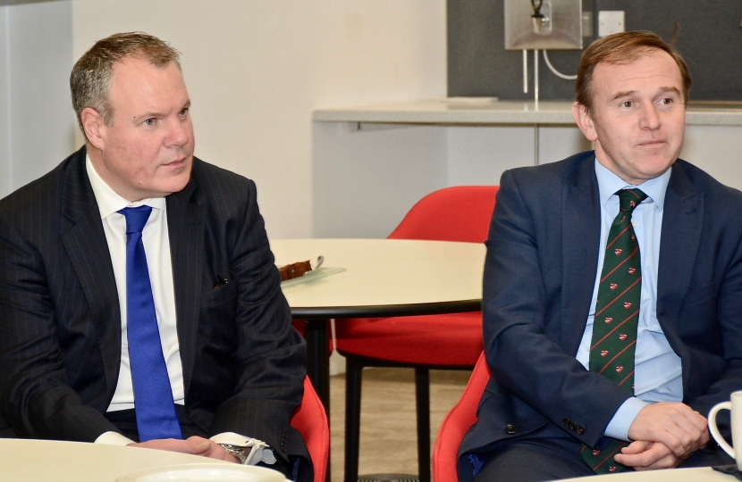 Conor pictured with George Eustice MP and three BU students. 