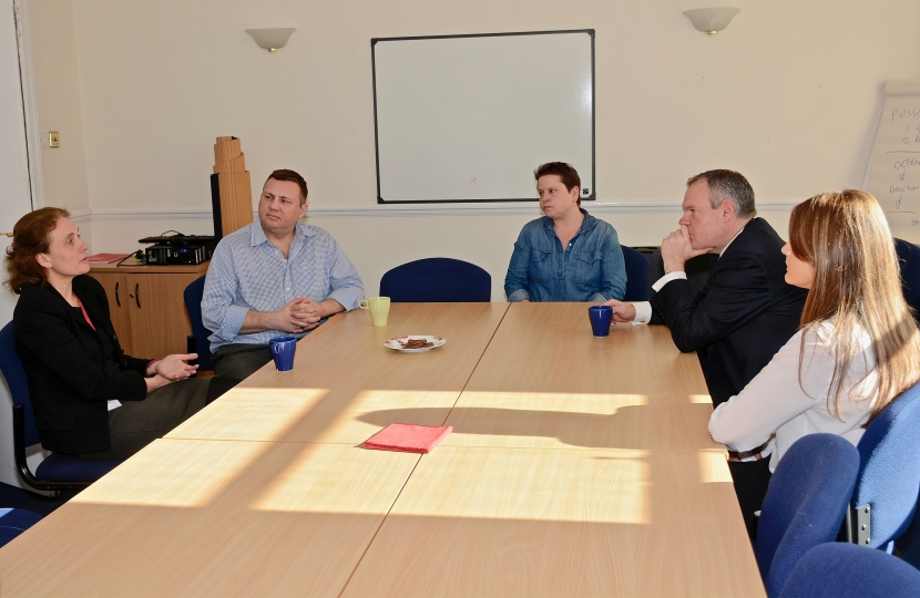 Conor pictured listening to Kate Parker, Dorset Hub Manager, about their work.  