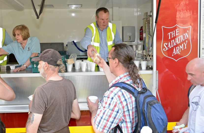 Conor pictured handing out food with the Salvation Army over the May Bank Holiday weekend. 