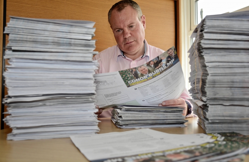 Conor reading some of the many responses to his constituency survey.