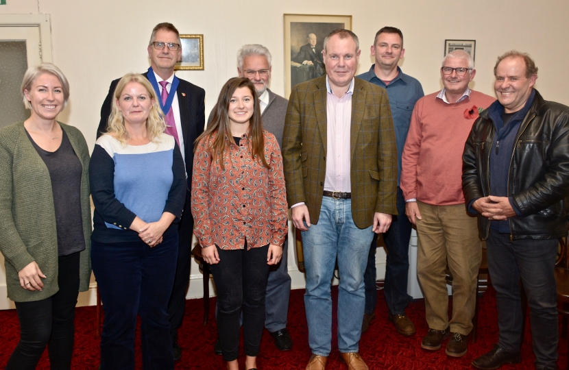 Conor and Cllr Don McQueen with members of Moordown Traders Association.