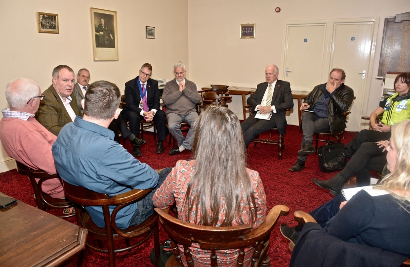 Conor discussing issues facing local businesses with members of Moordown Traders Association.