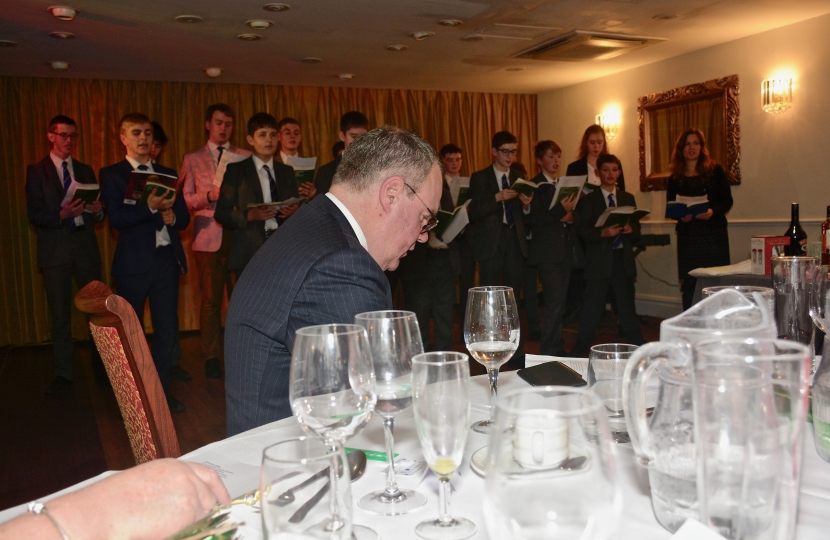 Conor listens to Bournemouth School Choir singing carols at the Bournemouth West Conservatives Christmas lunch.