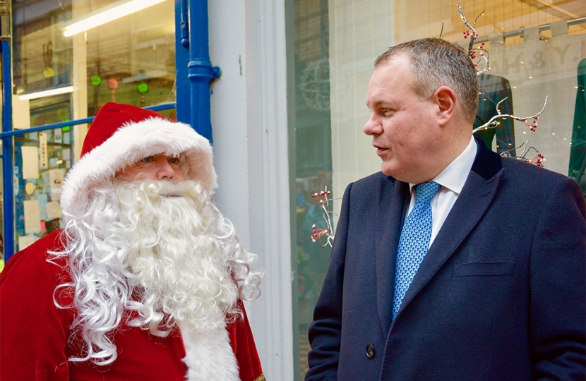 Conor welcoming Santa to Westbourne Arcade.