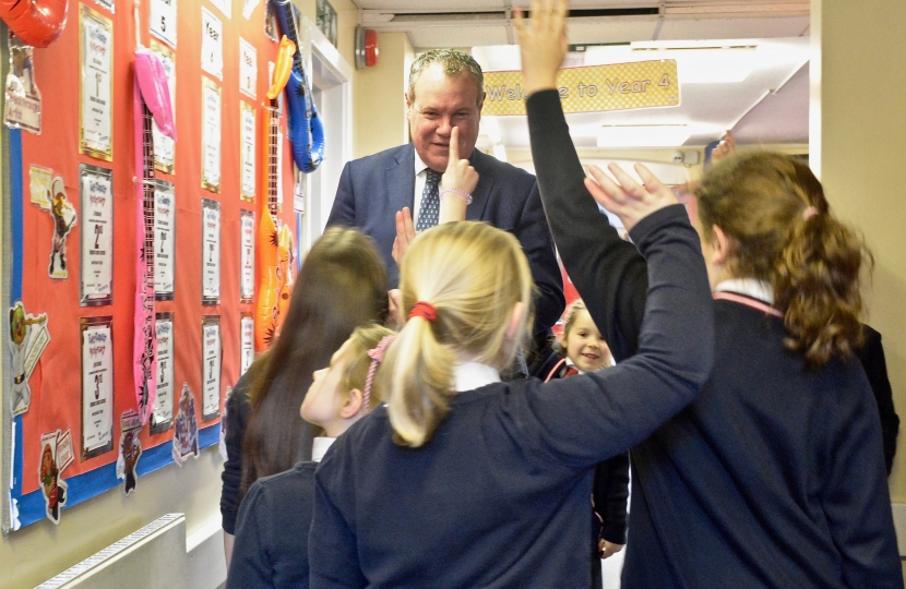 Conor with pupils from St John's School, Moordown.