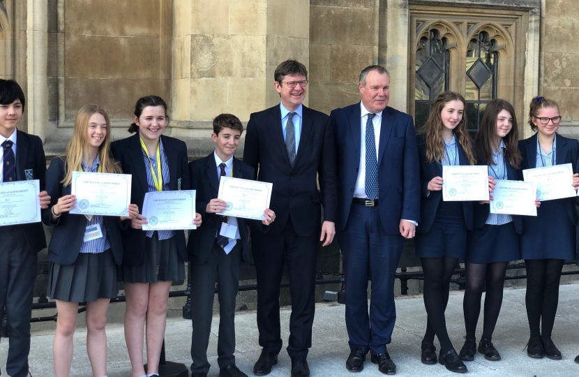 Pupils are presented with their certificates by Conor and the Secretary of State.