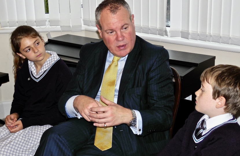 Conor speaking with pupils at Talbot House School.