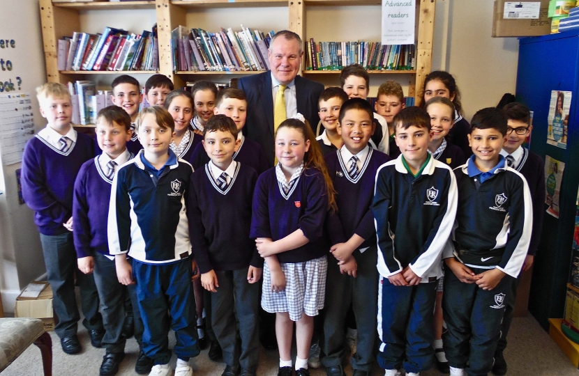 Conor with pupils at Talbot House School.