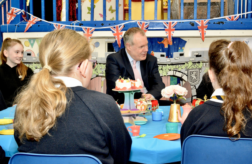 Conor celebrating the coronation with local pupils