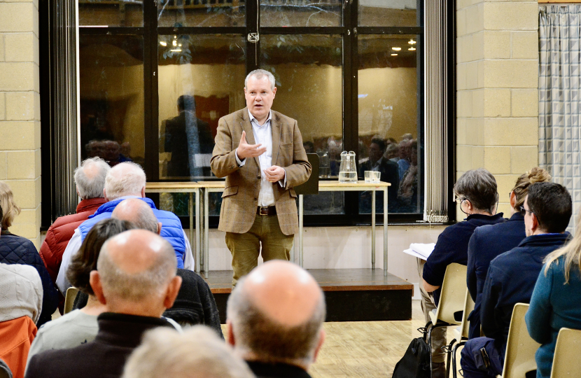 Conor at a public meeting