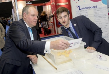 Conor speaking with members of Cancer Research UK.