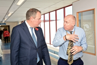 Conor pictured walking through Royal Bournemouth Hospital with Chief Executive, Tony Spotswood. 