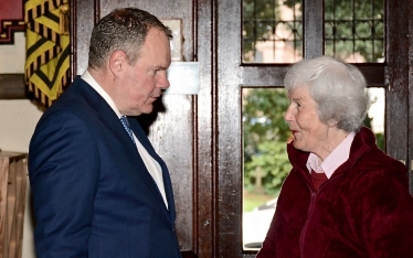 Conor pictured with a St Peter’s Church volunteer. 