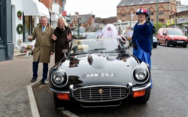 Conor pictured with Westbourne Rotary Club organisers and Santa Claus who arrived in a vintage sports car. 