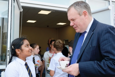 Conor pictured talking to the outgoing Head Girl.