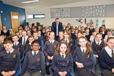 Conor with pupils at St Joseph's School, Alderney.